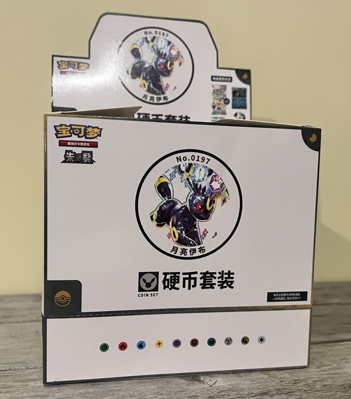 Pokémon Terastal Gathering Umbreon Coin Box display with 10 sealed units
